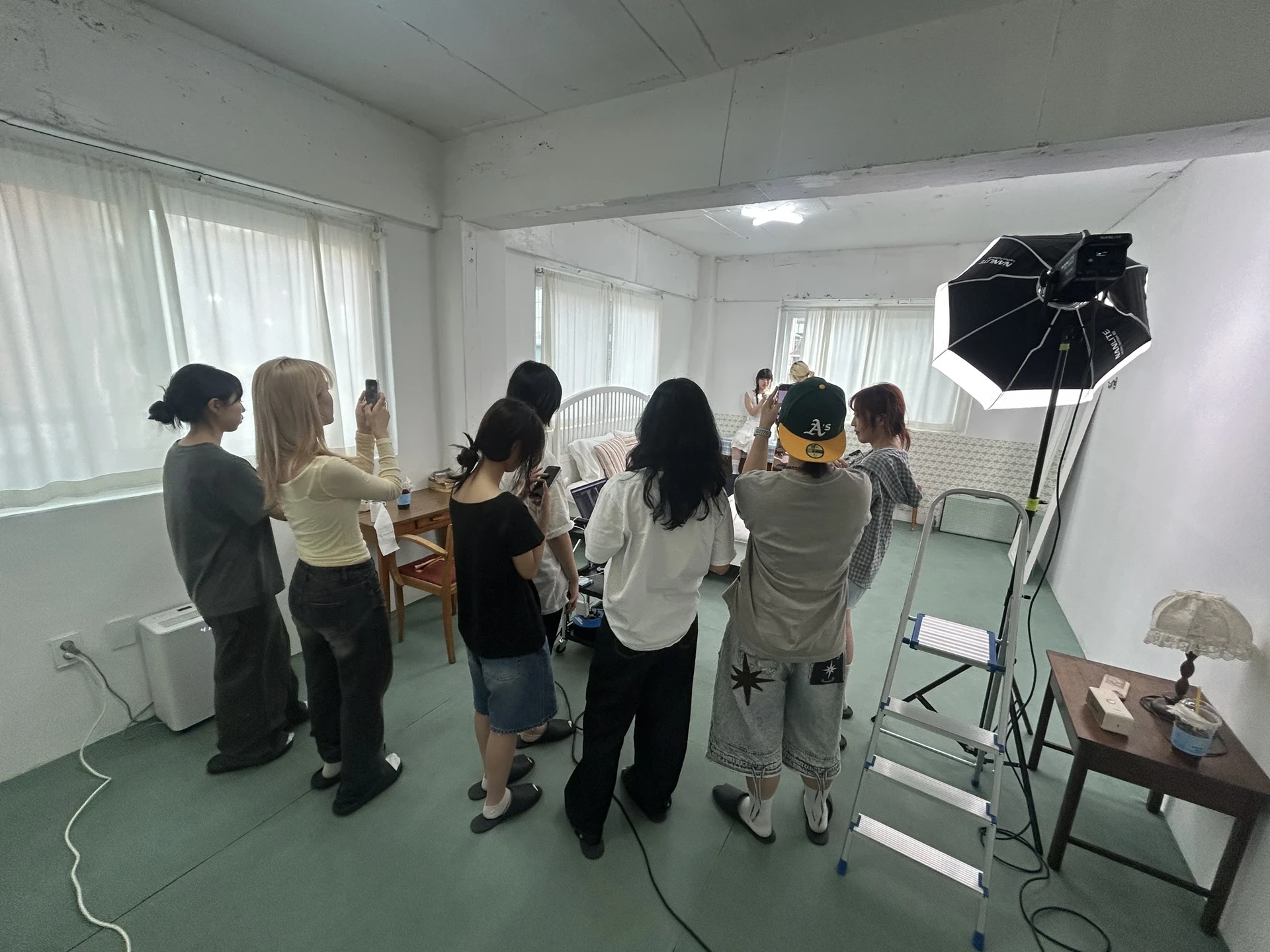 Participants working together on a visual production shoot